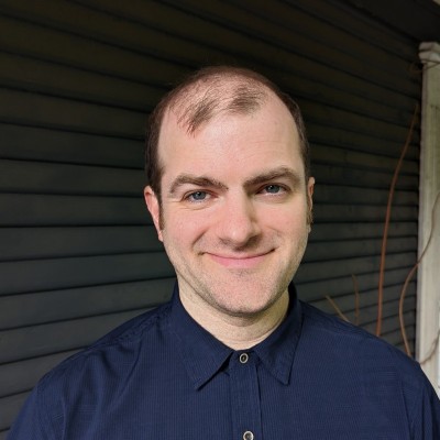 Headshot of the site's creator